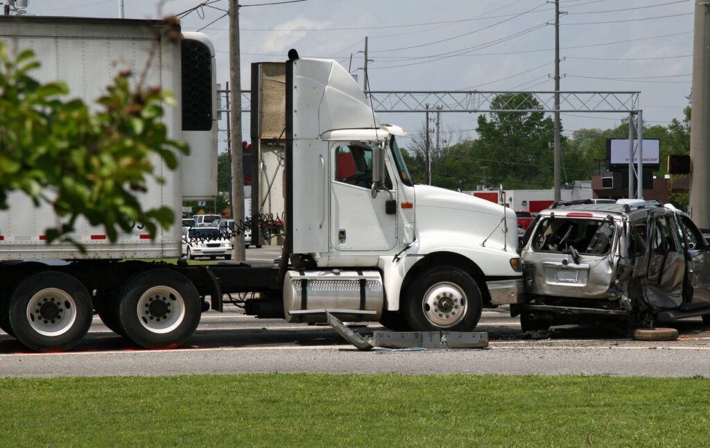 White truck crashed a car which resulted in a truck accident