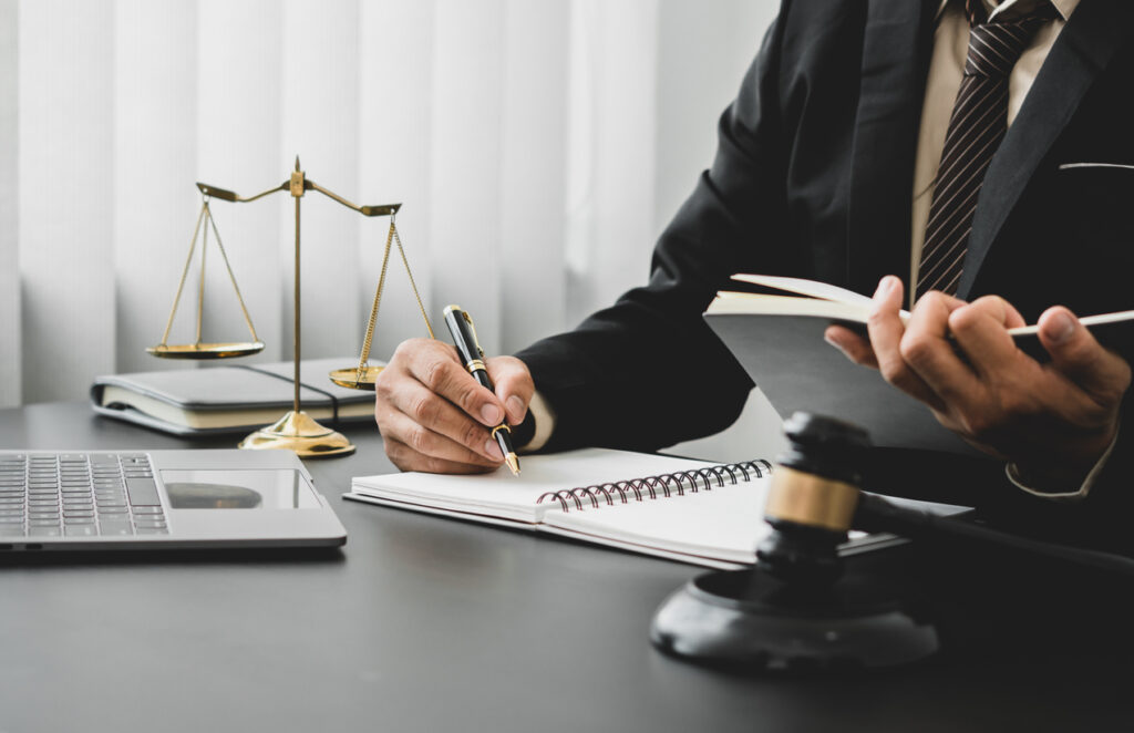 Personal Injury Lawyer working in his office