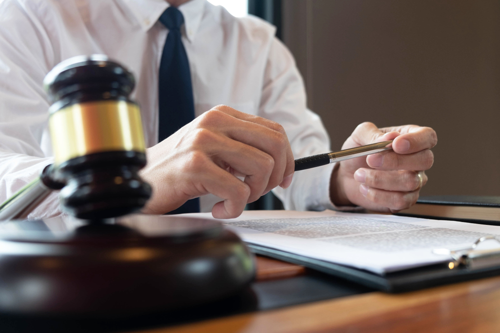 Group of lawyers consulting in a meeting, discussing business matters and legal cases to ensure justice.