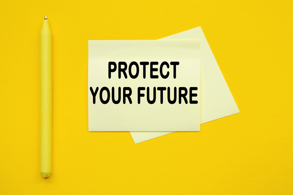 Yellow pen and stickers on a yellow background with the text "PROTECT YOUR FUTURE.