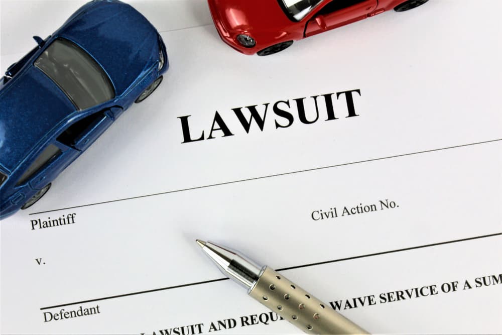 Lawsuit document with car models