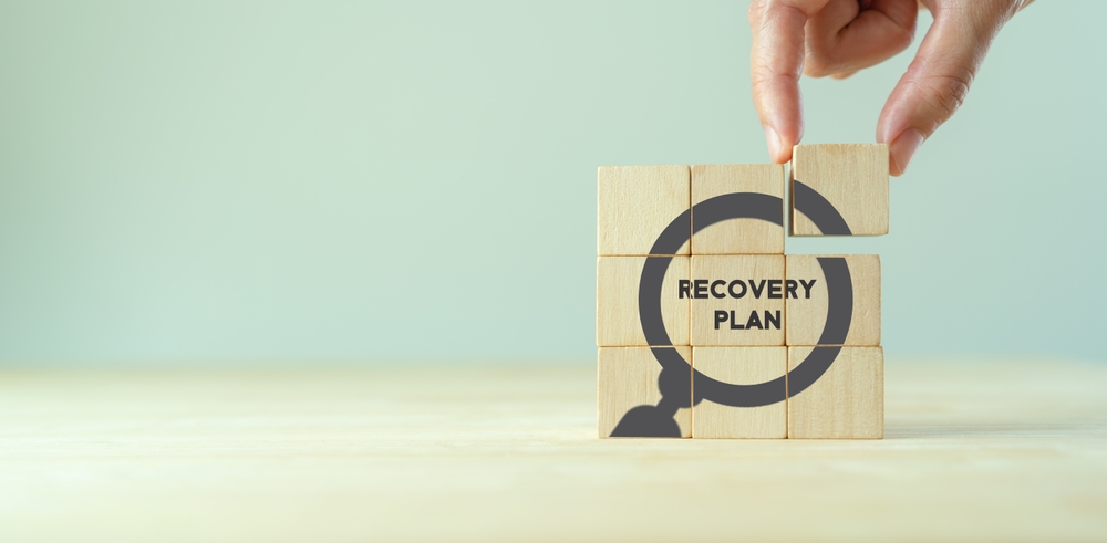 Recovery plan in recession concept with keywords like customer priority, marketing strategies, staff management, networking, and innovation.